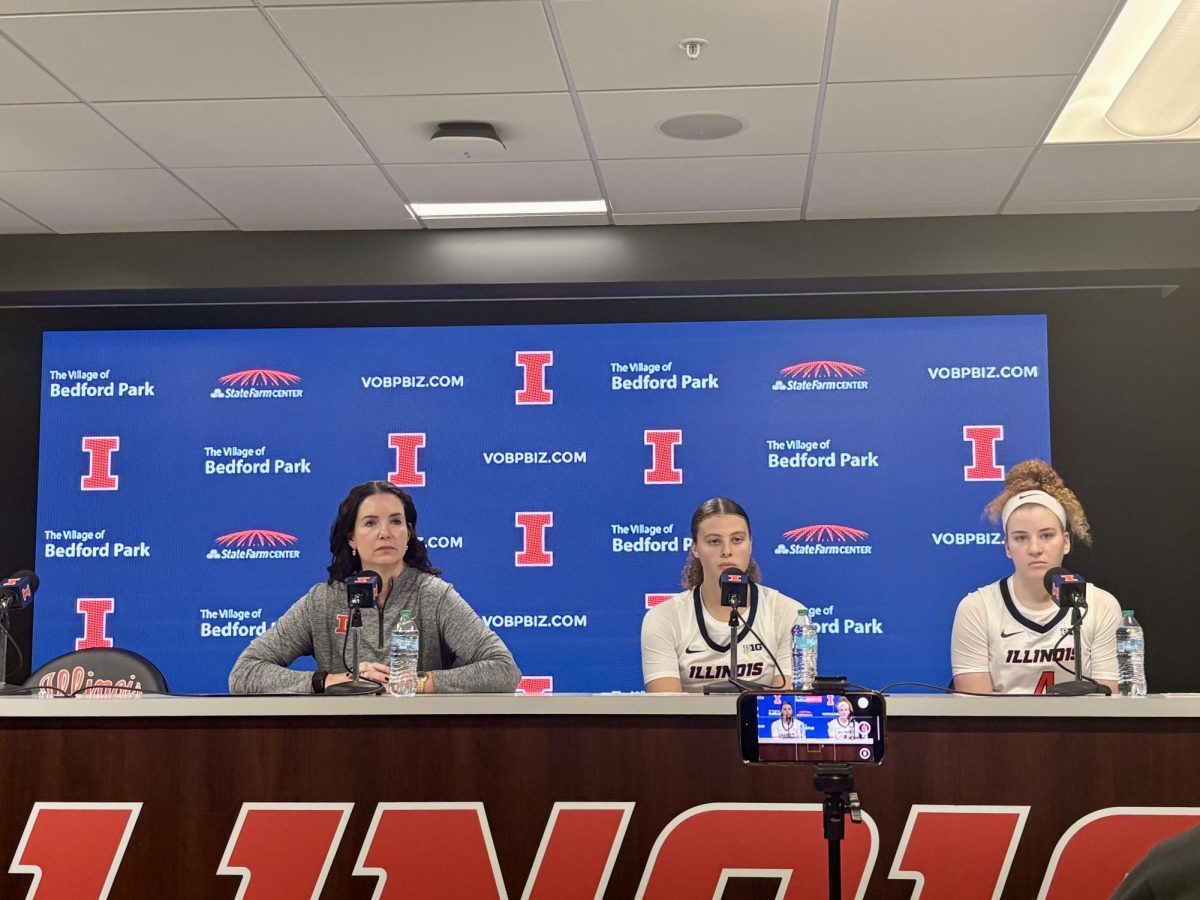 Head coach Shauna Green, freshman forward Cearah Parchment and junior guard Gretchen Dolan sit during the post game press conference on Oct. 30.