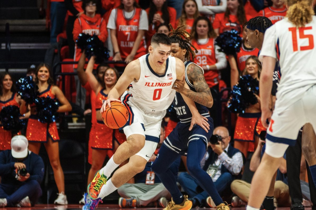 Freshman forward David Mirković backs down his Jackson State defender on Nov. 3 at State Farm Center.