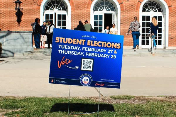 A flyer for the Spring 2024 student elections stands near the Illini Union on Feb. 26, 2024. Student representatives say newly implemented changes to the election enforcement body were made without consultation, raising concerns about shared governance and autonomy.