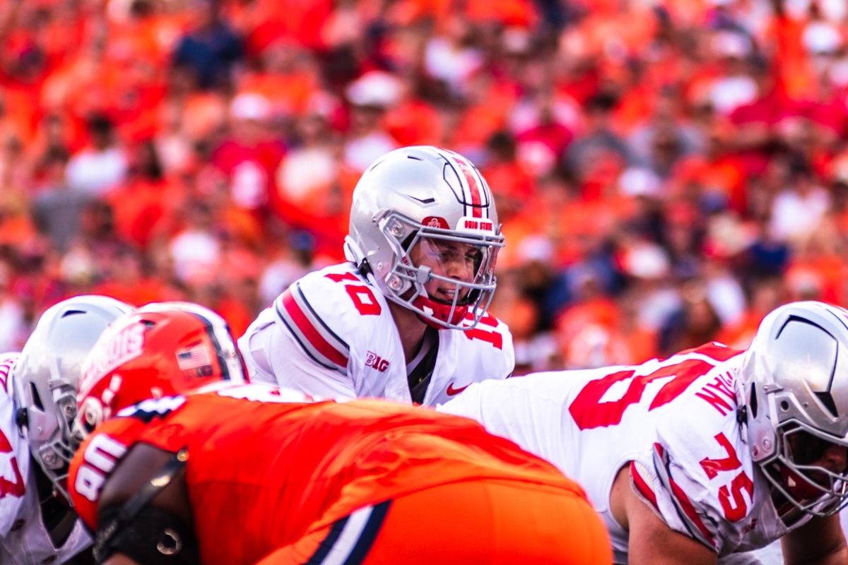 Ohio State quarterback Julian Sayin prepares to take a snap during the team's win over Illinois on Oct. 11. 