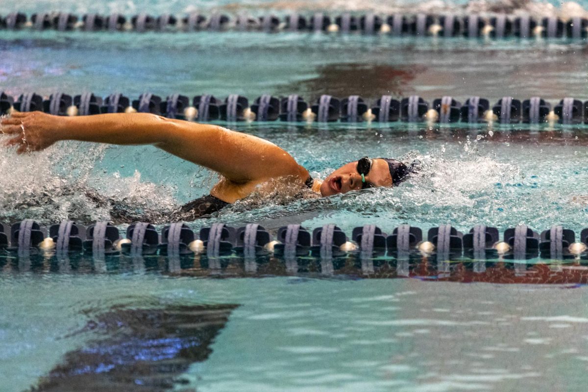 Senior freestyle swimmer Liv Dorshort competes in the House of Paign meet at the ARC pool on Oct. 24.