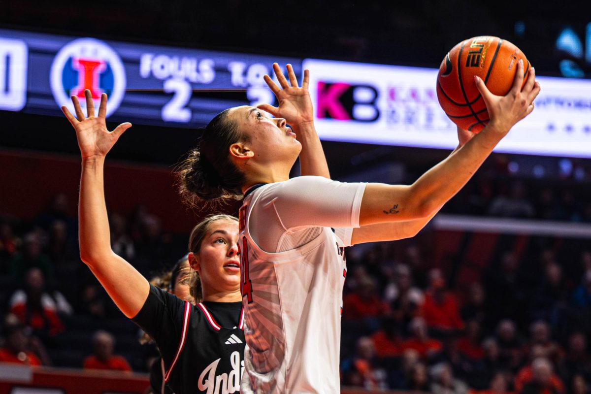 Illinois junior Guard Maddie Webber goes up for the reverse layup against Indiana on Dec. 6.