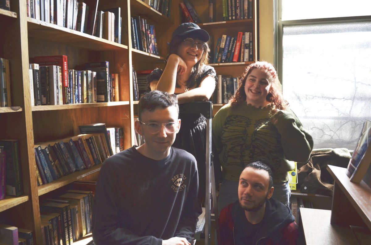 Sean Wilkinson, sin ham, Ocean Thoreau and Jay Piser of sorry forever pose for a photo.