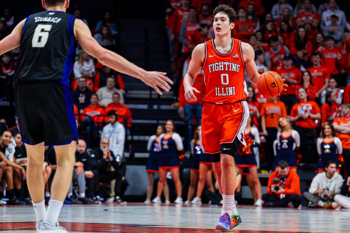 Freshman forward David Mirković dribbles the ball up the court in Illinois' win over Washington on Jan. 29, 2026.