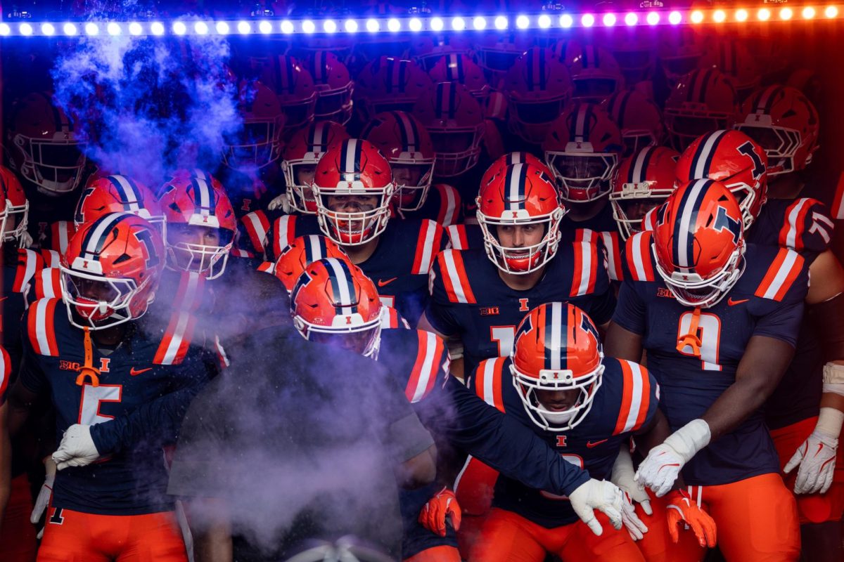 Illinois players wait in the tunnel as they prepare to run onto the field before the team’s game against Western Illinois on Aug. 29, 2025.