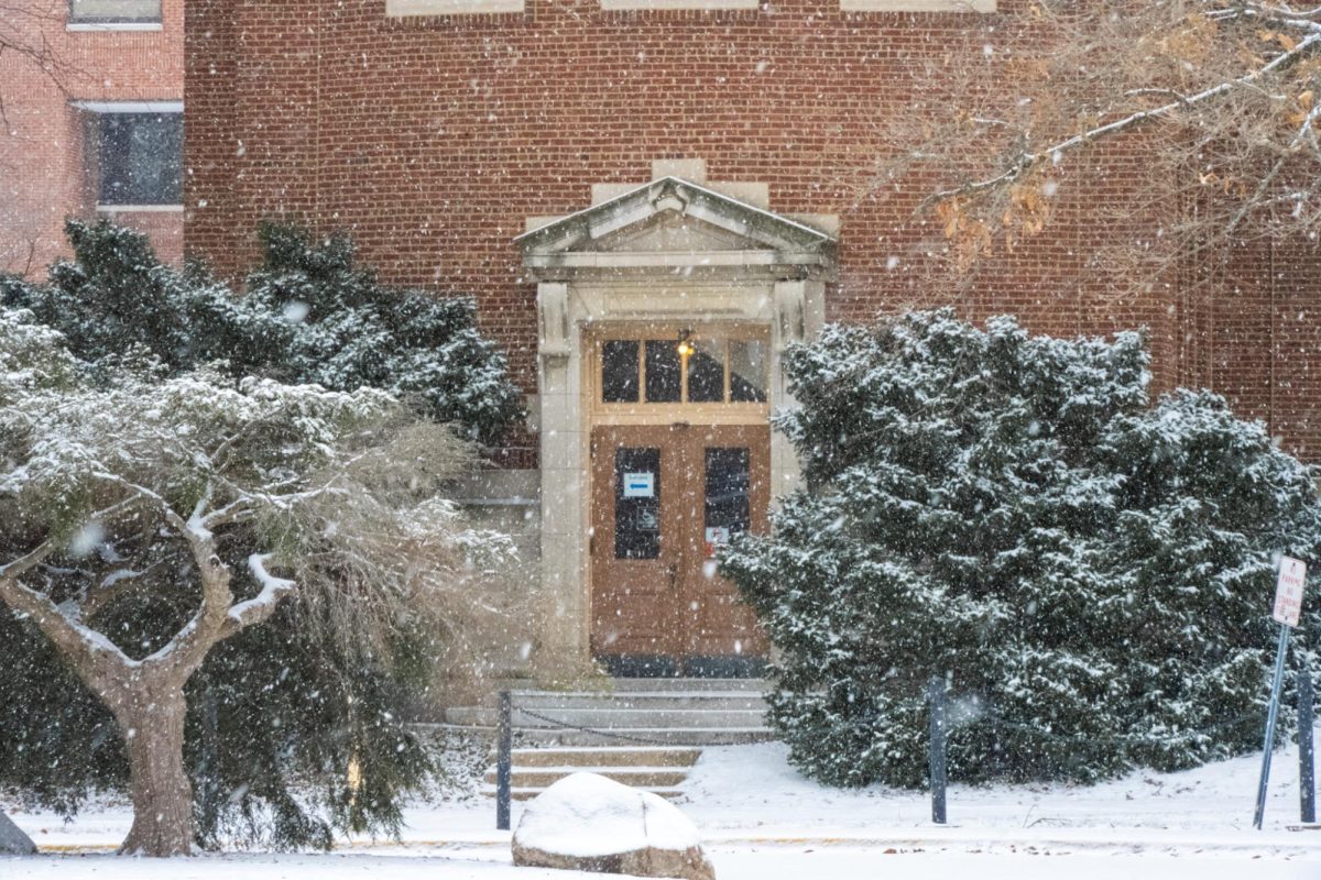 Foellinger Auditorium stands under heavy snowfall on Jan. 5, 2025. Champaign-Urbana is bracing for reach dangerously cold wind chills this weekend, with expected of snowfall of 5 to 9 inches.