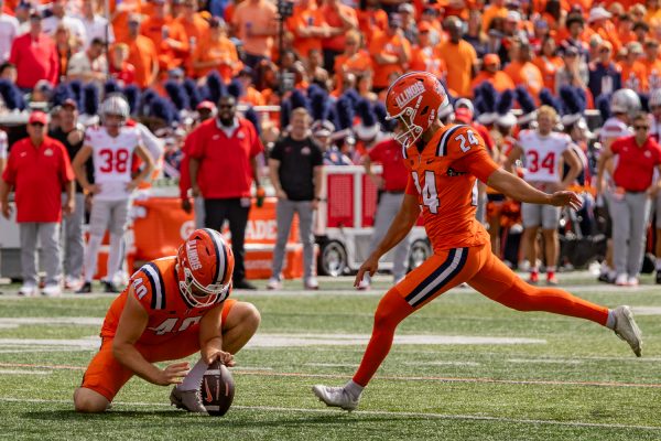 Junior kicker David Olano kicks a 24-yard field goal, scoring Illinois’ first points with 1:05 left in the second quarter at the game vs. No. 1 Ohio State University on Oct. 11. The Buckeyes defeated the Illini 34-16.