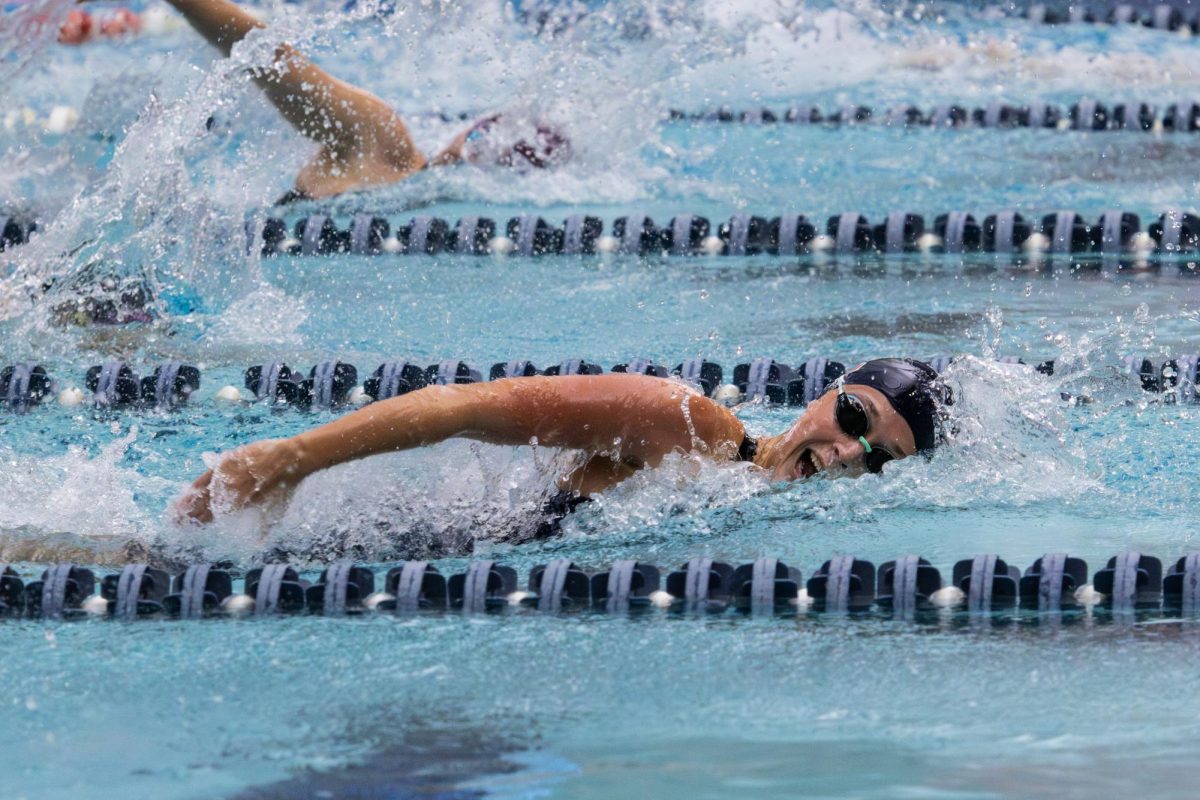 Junior free swimmer Maggie Adler competes in the 400 yard freestyle relay for Illinois at the "House of Paign" swim and dive meet on Oct. 24, 2025.