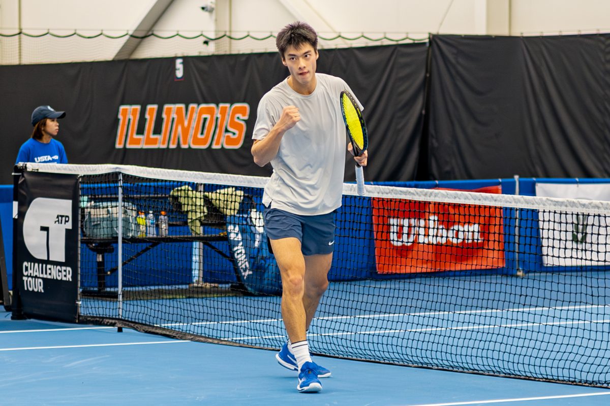 Senior Kenta Miyoshi celebrates winning a crucial point at Atkins Tennis Center on Nov. 14, 2025.