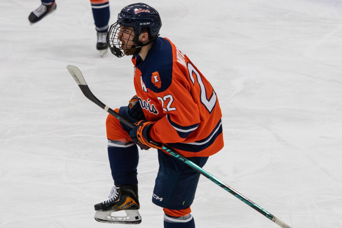 Sophomore forward Carson Mitchell celebrates after scoring against Roosevelt University at the Illinois Ice Arena on Dec. 5, 2025. The Illini beat the Lakers 7-3.
