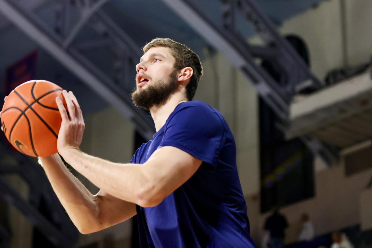 Junior center Tomislav Ivišić warms up before a a game against Penn State in Philadelphia on Jan. 3.