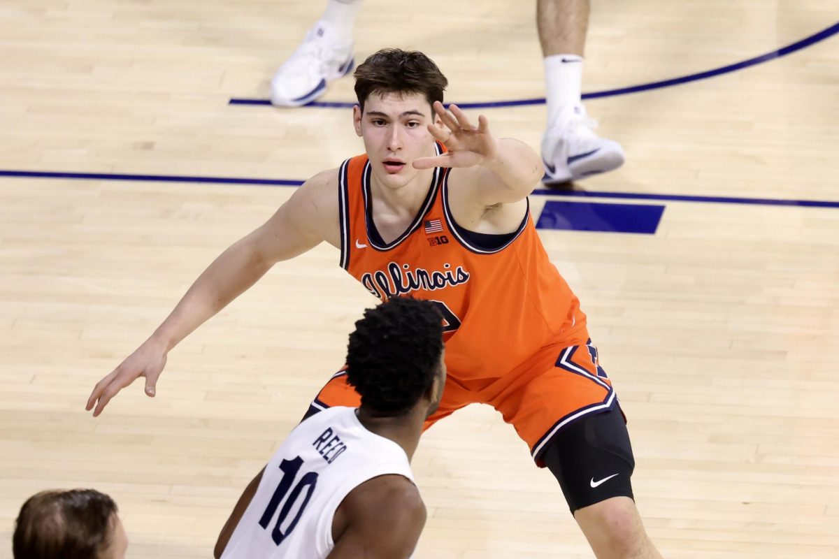 Freshman forward David Mirković defends Penn State senior forward Josh Reed at The Palestra on Jan. 3.