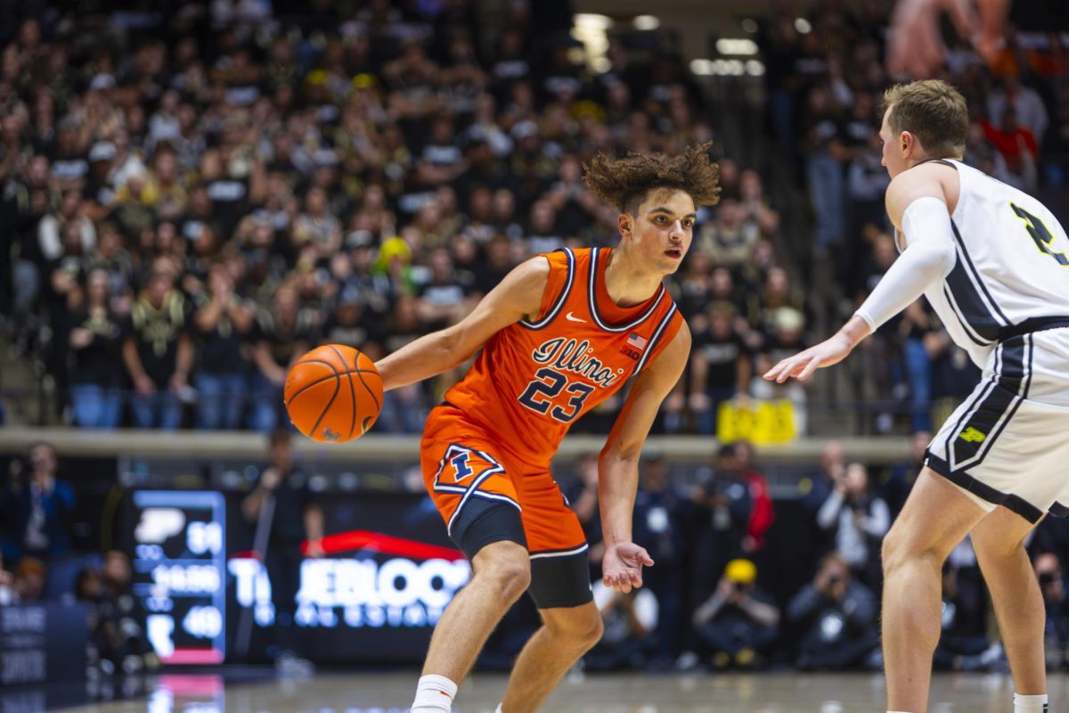 Illinois freshman guard Keaton Wagler handles the ball against Purdue at Mackey Arena on Jan. 24.