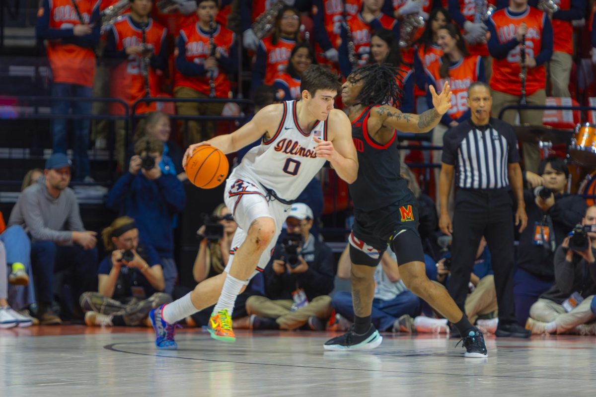 Freshman forward David Mirković backs down a Maryland defender in Illinois victory over Maryland on Jan. 21, 2026. Mirković finished the matchup with 15 points and nine rebounds. 