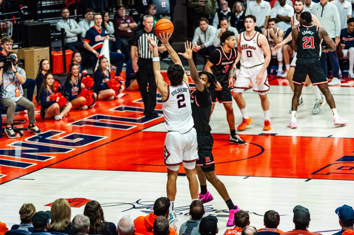 Junior wing Andrej Stojaković shoots a left wing three in Illinois' 81-55 win over Rutgers on Jan. 8. Stojaković ended the game with 12 points and eight rebounds.