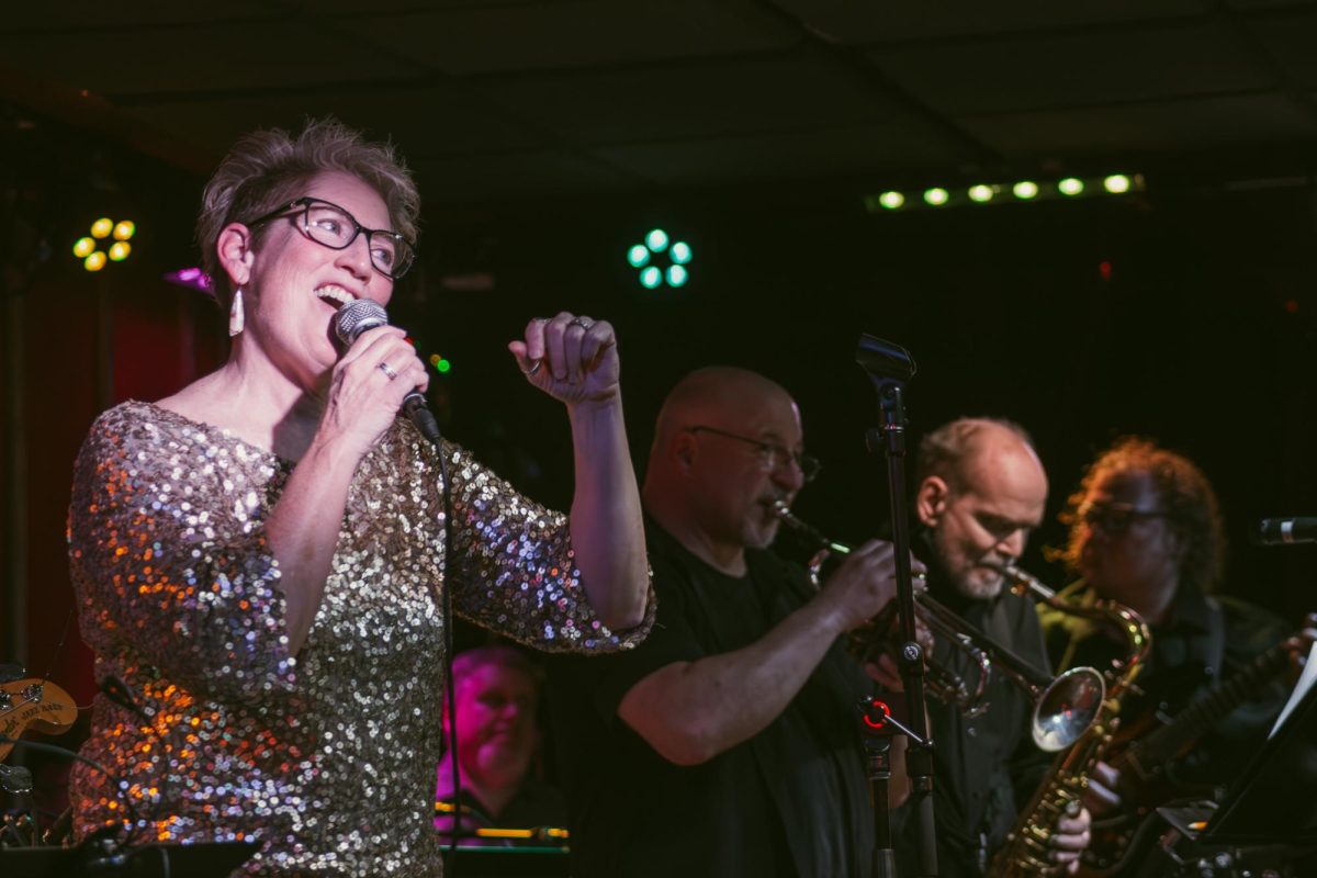 Lisa Castang and Ther’Up.Y performs tributes to Prince and Tiana Turner in front of a sold out crowd at The Rose Bowl Tavern on Feb 20. Ther’Up.Y began as a house band for the Champaign-Urbana music series Soul on Sunday, and have since provided opportunities for local artists to join them.