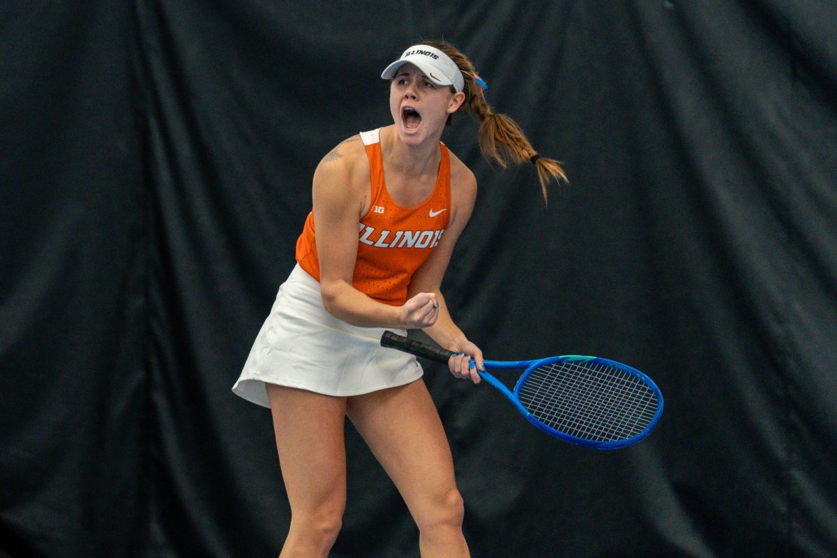 Senior McKenna Schaefbauer celebrates winning her match and securing the fourth point, leading Illinois to defeat Miami Ohio at Atkins Tennis Center on Jan 24. 