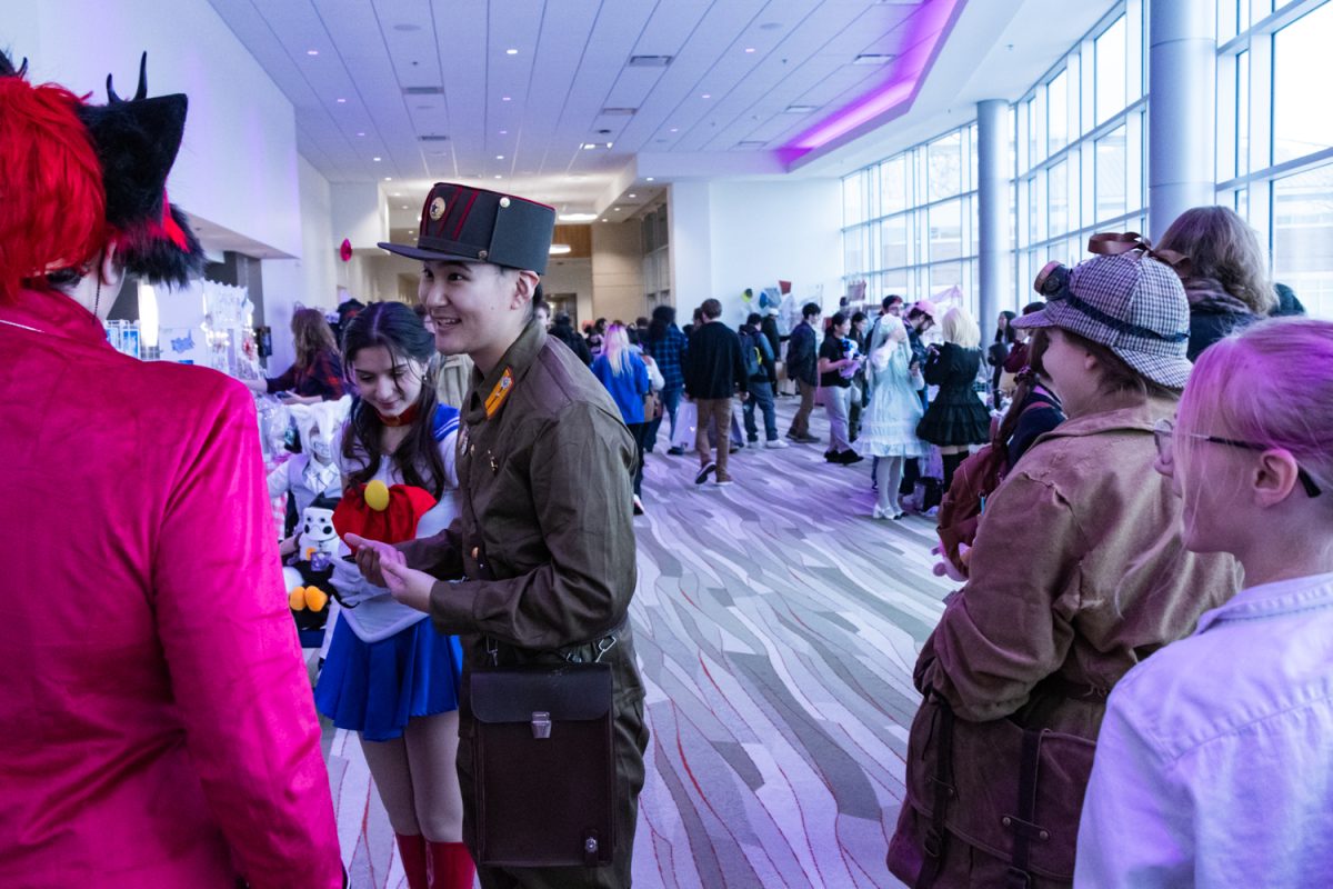 Cosplayers chat together at the third annual UI-CON in the iHotel on Jan. 31. UI-CON is an annual anime convention which was moved to the iHotel after spending its first two years in the Illini Union.