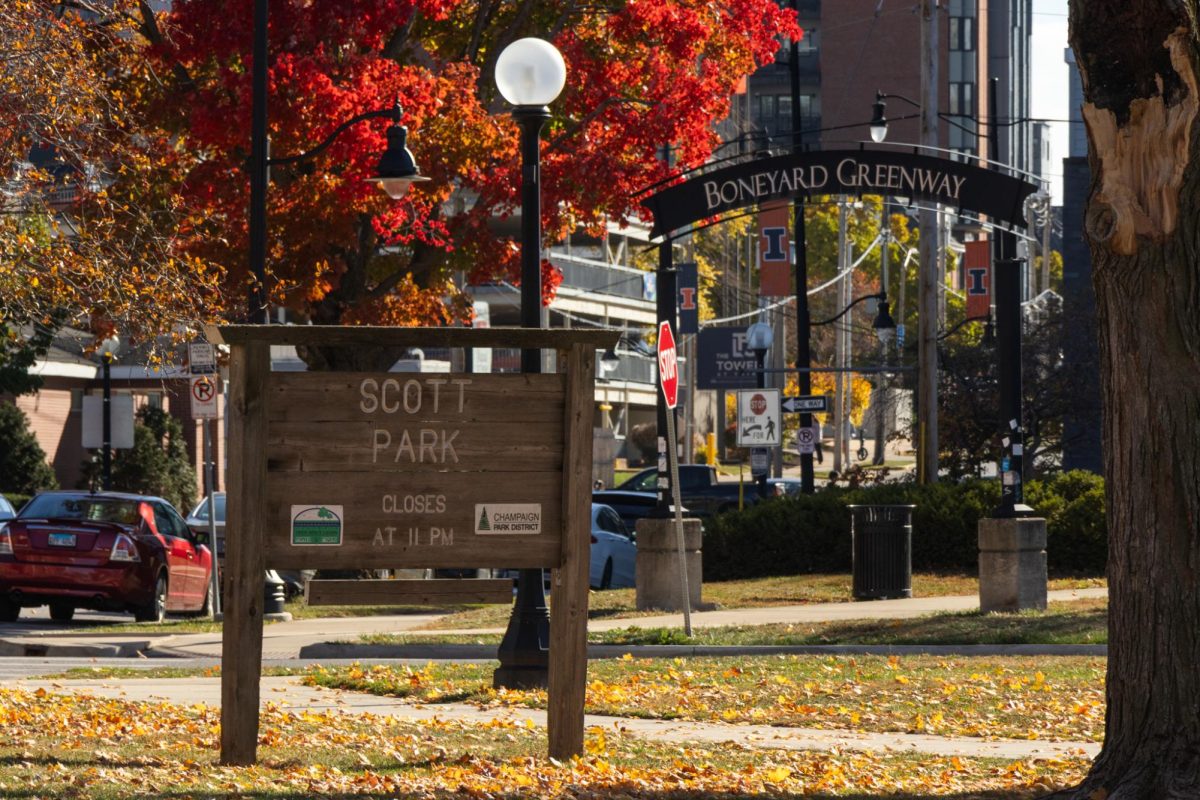 Leaves sit on the ground near a sign for Champaign Park District's Scott Park on Nov. 7, 2025. Rep. Nikki Budzinski, who represents Illinois' 13th congressional district — which includes much of Champaign-Urbana — announced $2.3 million in funding for local park districts and the University. 