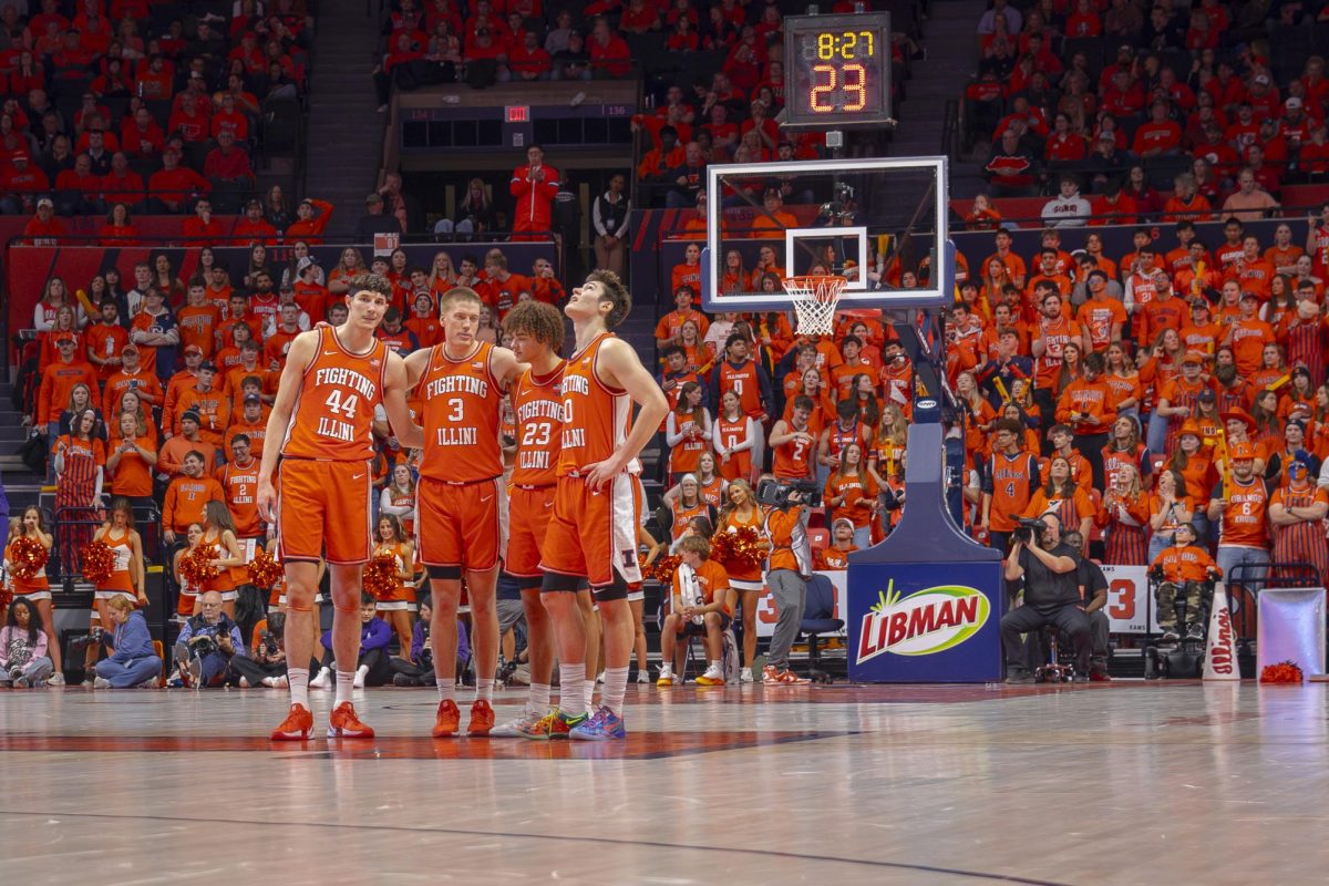 The Illini stand at half court during a Feb. 4 game against the Northwestern Wildcats at State Farm Center.