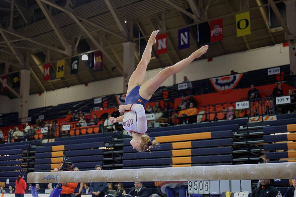 Junior Lyden Saltness performs her beam routine during Illinois' meet against Maryland on Feb. 1st.