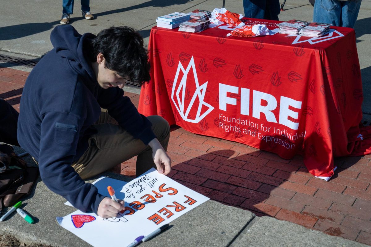 Representatives for the Foundation for Individual Rights and Expression table on the Main Quad on Feb. 10. The free speech group came to urge the University not to investigate the Illini Republicans' controversial social media post. 