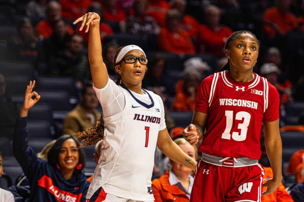 Sophomore guard Aaliyah Guyton follows through with a three point attempt during the Illinois v. Wisconsin game on Feb. 11.
