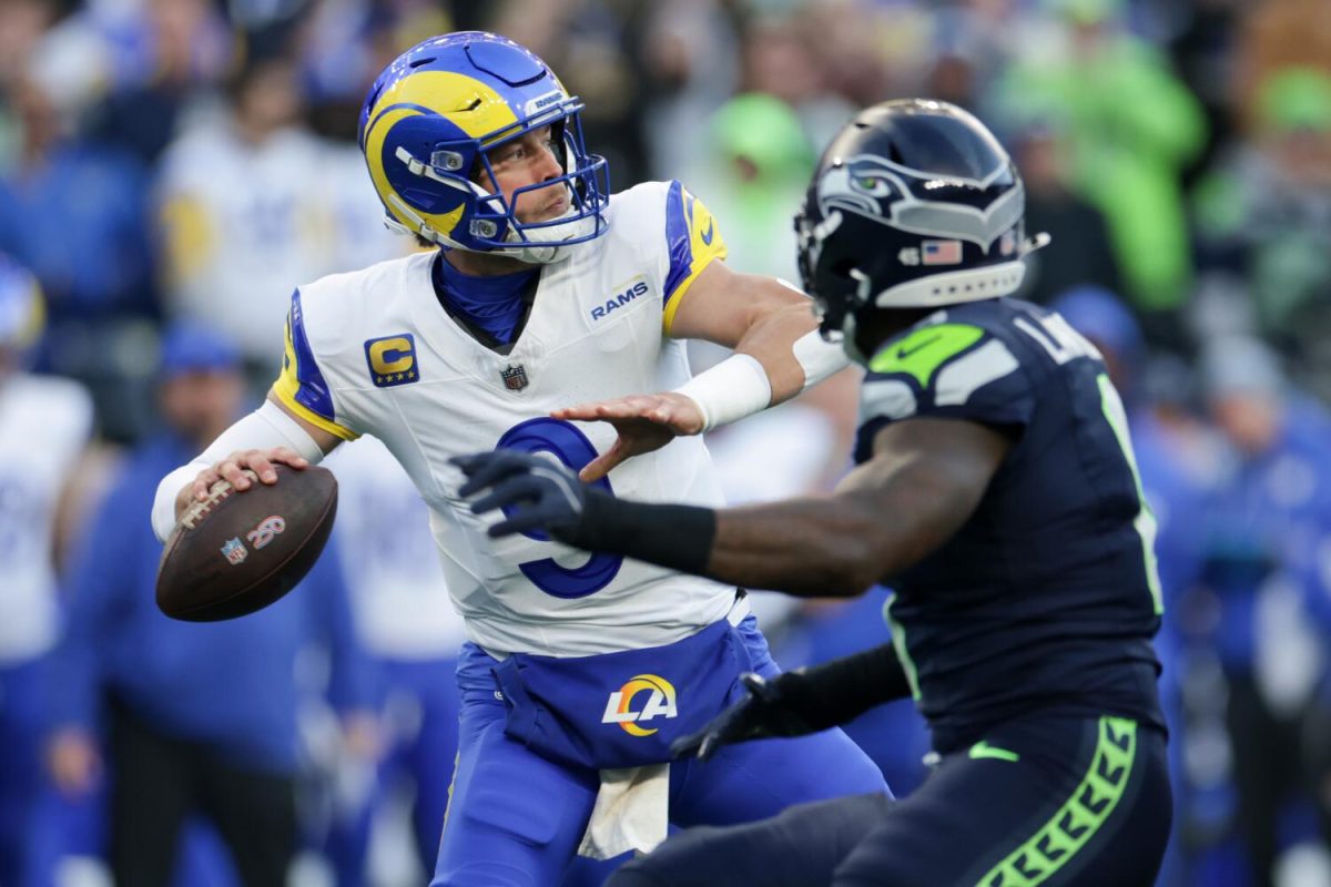 SEATTLE, CA - JANUARY 25: Los Angeles Rams quarterback Matthew Stafford (9) looks to throw a pass during the first quarter of the NFC championship game against the Seattle Seahawks at Lumen Field on Sunday, Jan. 25, 2026 in Seattle, CA. (Robert Gauthier / Los Angeles Times)