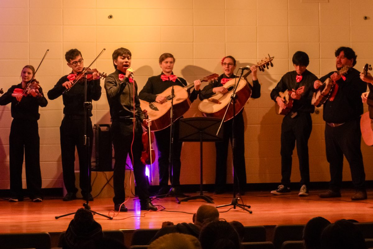 Mariachi Tigres de Urbana perform in front of a crowd at the Krannert Art Museum for Latina Voces on Jan. 30.