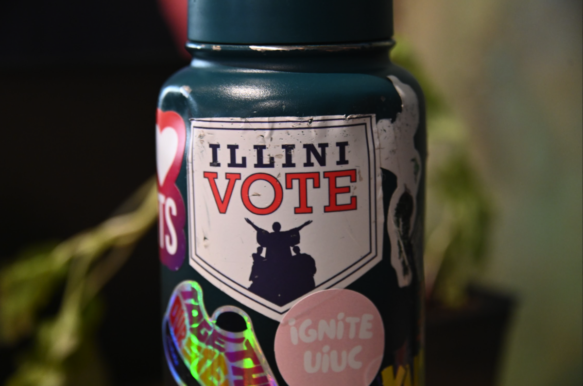 A sticker which reads, "ILLINI VOTE" sticks to a water bottle on Feb. 24, 2025. The Student Election Board is holding candidate town halls ahead of the upcoming student elections.