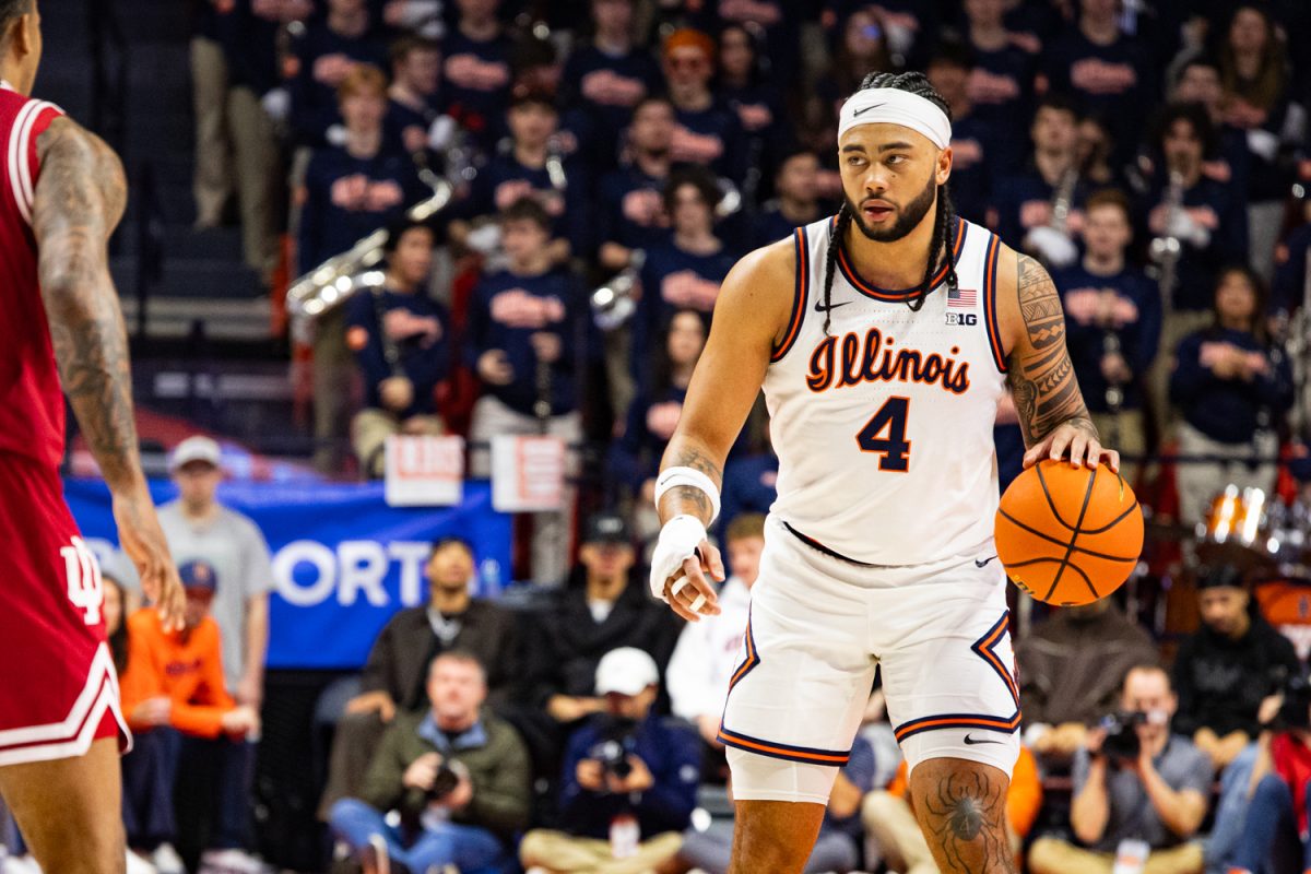 Illinois senior Kylan Boswell takes the ball down the court in a game against Indiana Feb. 15. 