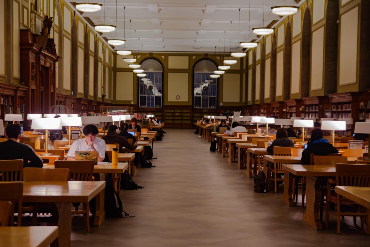 Students study in the Reading Room on the second floor of the Main Library, located at 1408 W Gregory Dr in Champaign, on Feb. 19. The Main Library, home to several collections such as the Main Stacks and the Rare Books and Manuscripts Library, contains a large share of the 15 million volumes held by the University of Illinois.