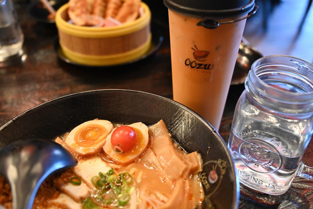 A student digs into their Spicy Creamy Vegan Ramen at Oozu Ramen on Saturday, Feb. 21. The popular ramen place sits at 601 S 6th St #102, Champaign.