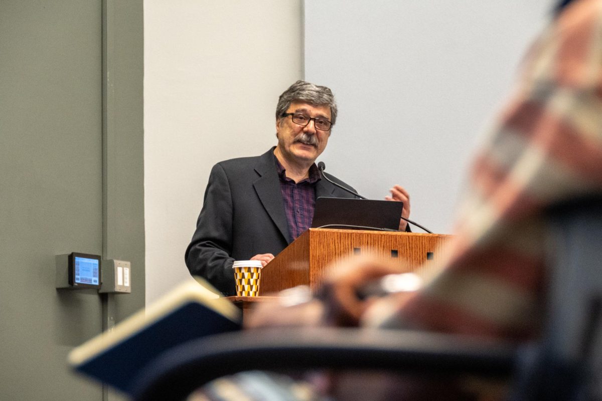 Dr. Behrooz Ghamari-Tabrizi, former professor of history and sociology at Illinois, speaks about the complicateqd relationship between the United States and Iran over the years at a Book Talk at the Levis Faculty Center March 12. Dr. Ghamari-Tabrizi drew a full house with standing room only.