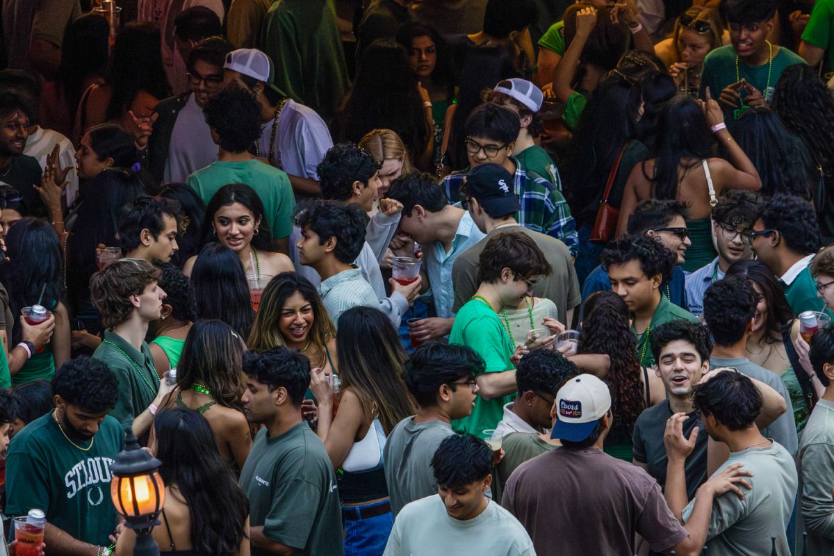 Patrons pack the patio at Red Lion on Friday during Illinois' unofficial St. Patrick Day's celebration. A popular competitor, Joe's Brewery, had its liquor license suspended the week prior.