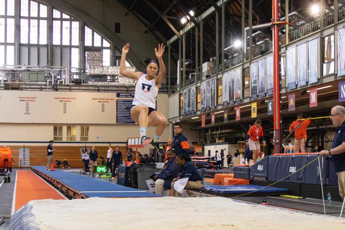 Jaicieonna Gero-Holt competes in the Women's long jump event at the Illini open in the Armory on Saturday, Jan. 10.