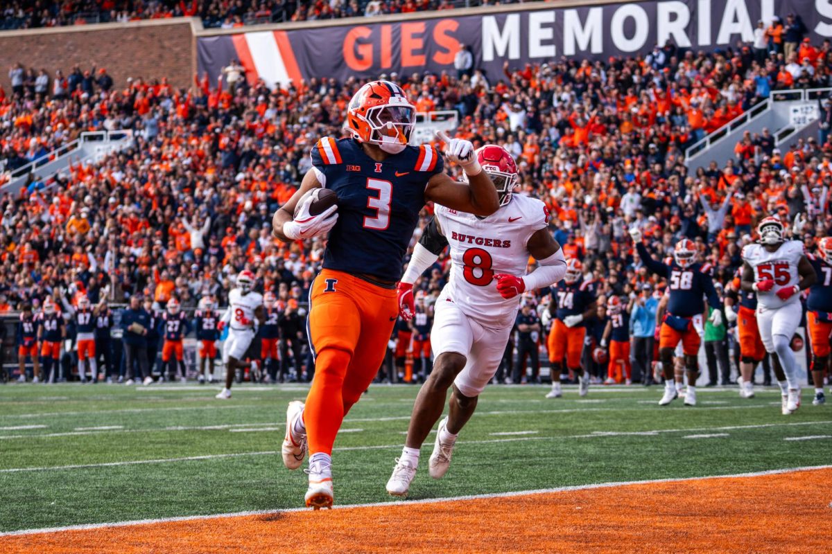 Junior running back Kaden Feagin scores a touchdown against Rutgers on Nov. 1, 2025. Illinois hosts its home games in Gies Memorial Stadium, newly dedicated after a $100 million donation from alum Larry Gies. 