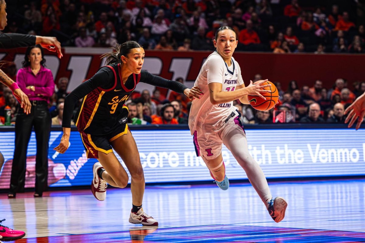 Junior guard Maddie Webber drives toward the paint during Illinois’ game against USC on Feb. 8.