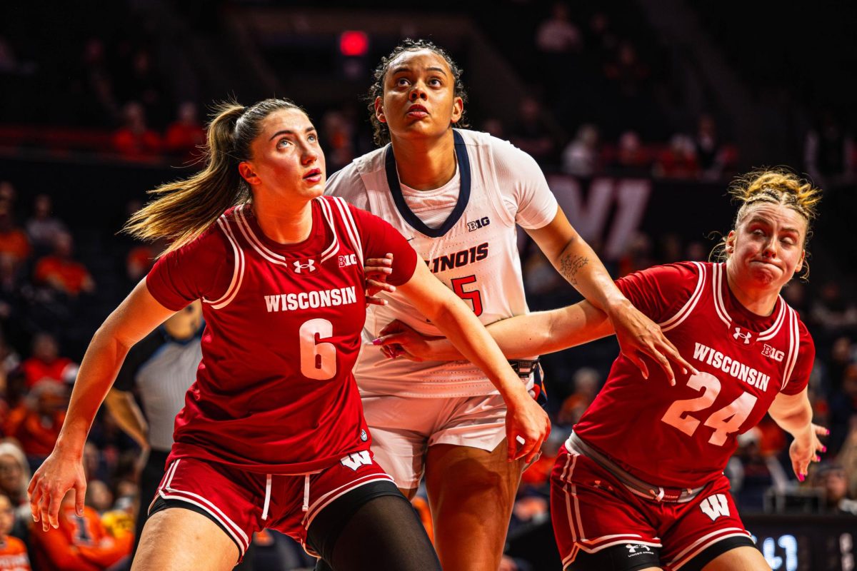Redshirt sophomore center Lety Vasconcelos goes for the rebound during a free throw during the Illinois v. Wisconsin game on February 11.
