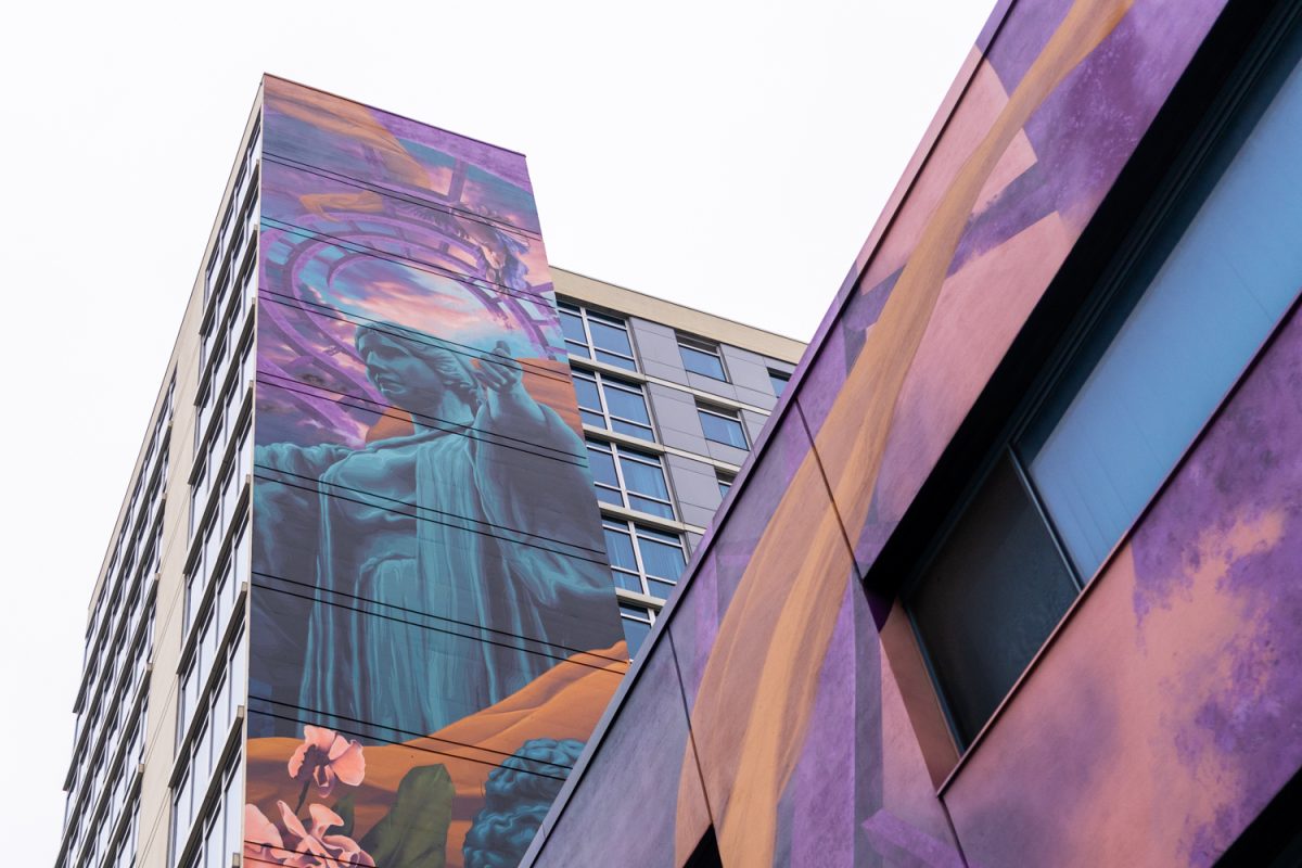 A mural of the Alma Mater adorns Skyline Tower on Green Street on Feb. 14. Chicago artist Levar Hoard painted the artwork on the building's exterior.