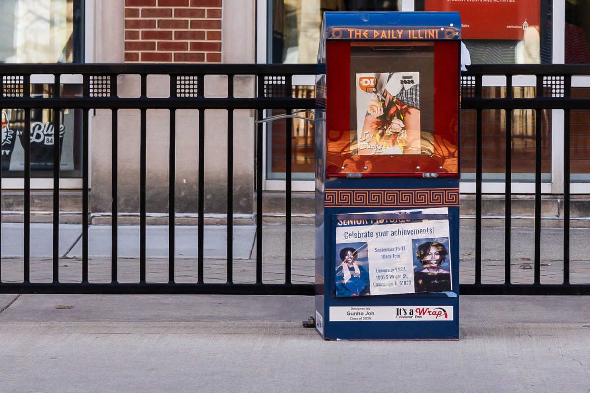A newsstand from The Daily Illini sits at Transit Plaza on Feb. 18. The Daily Illini won Best of CU's "Best Newspaper" category.