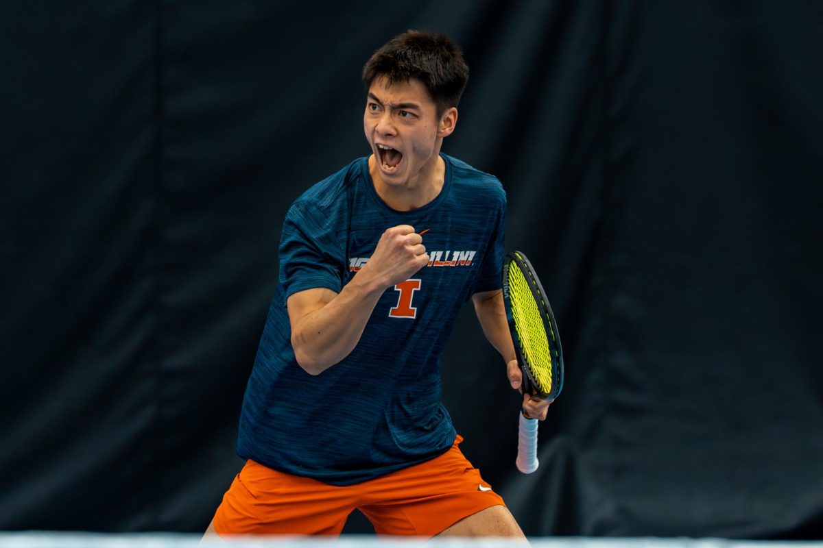 Senior Kenta Miyoshi celebrates clinching the doubles point for the Illinois win against Baylor on Feb. 27.