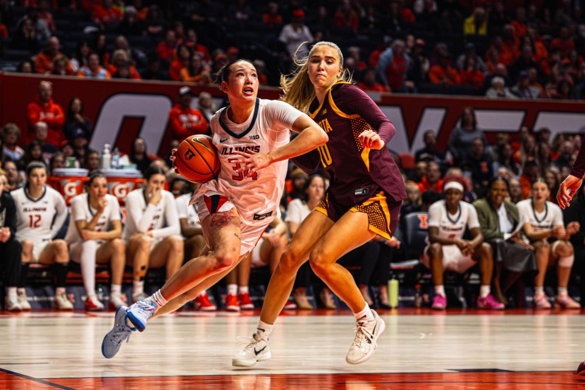 Junior guard Maddie Webber drives towards the rim during the Illinois v. Minnesota game on March 1. 