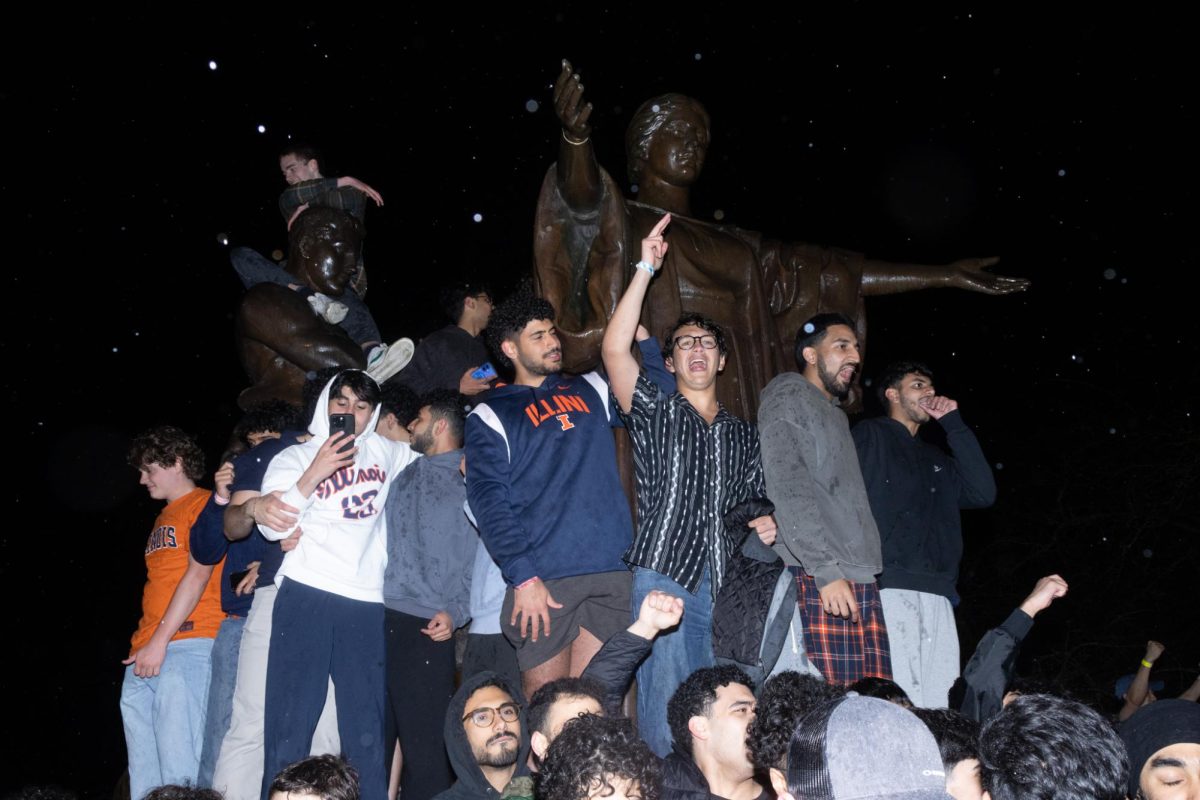 Students stand atop Alma Mater after Illinois defeated Houston in the Sweet 16 of the 2026 NCAA Men's Basketball Tournament on March 27. 
