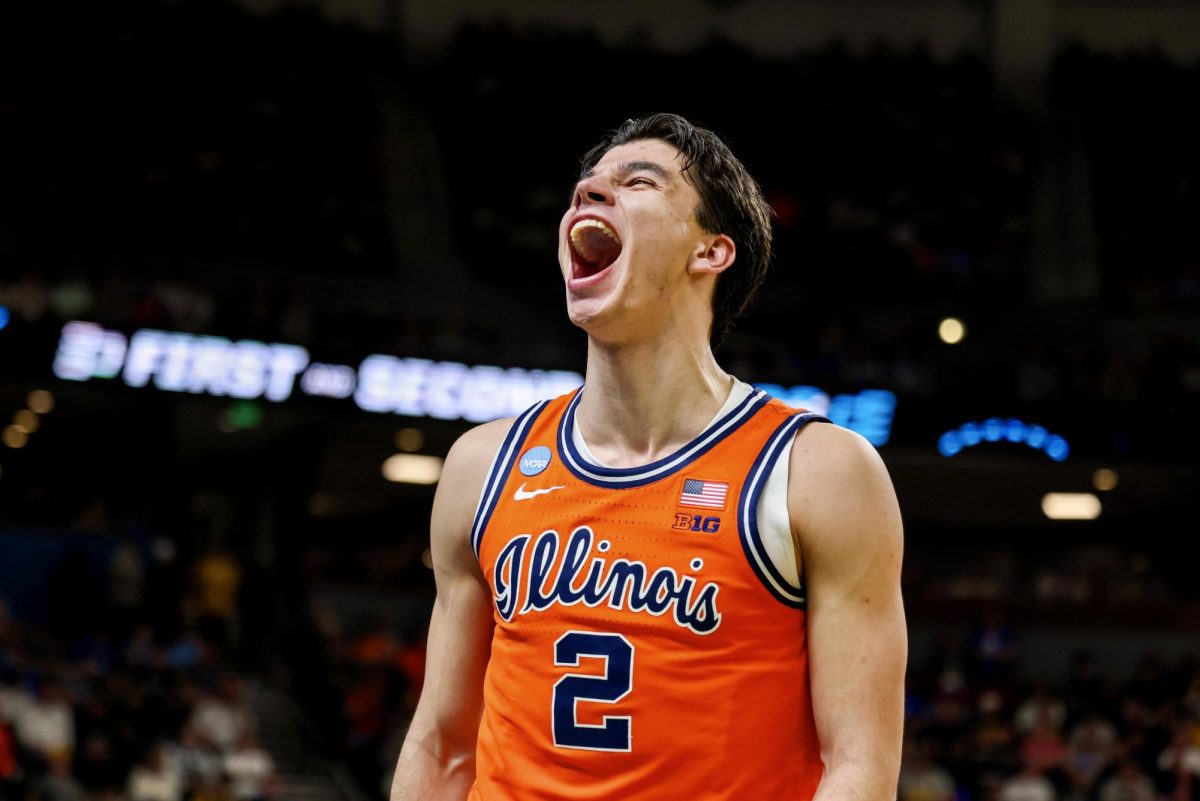 Illinois junior wing Andrej Stojaković screams toward a section of VCU fans after scoring an and-one layup in the first half of a March Madness second round win on March 21.