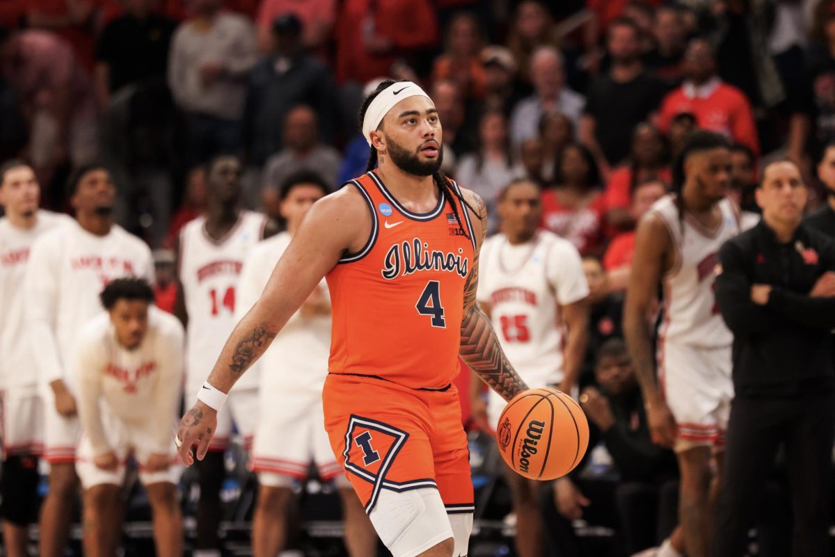 Senior guard Kylan Boswell brings the ball up the court during Illinois' Sweet 16 win over Houston on Thursday.