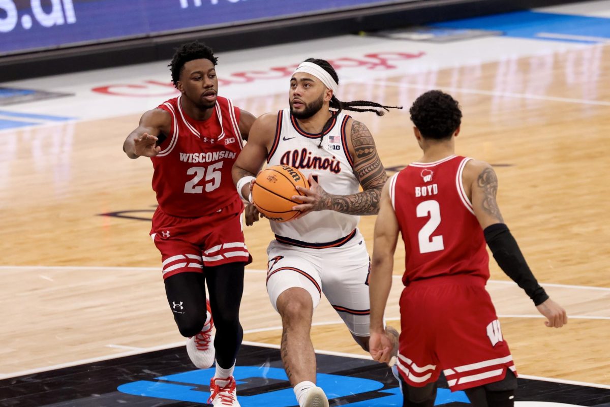 Senior guard Kylan Boswell drives to the rim in the second half of Illinois’ Big Ten tournament quarterfinal loss to Wisconsin.