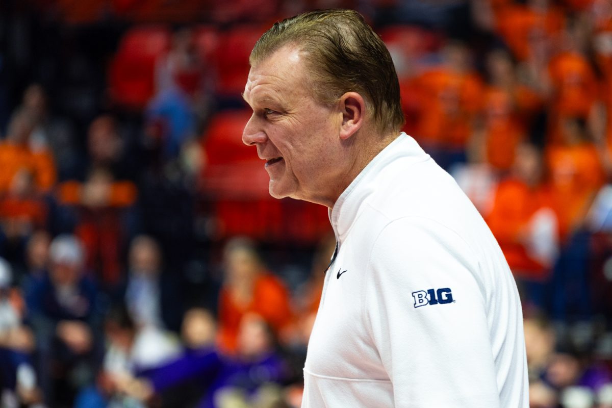 Head coach Brad Underwood looks out across the court during the Illinois vs. Northwestern game Feb. 4. Illinois defeated Northwestern 84-44, cementing their twelfth win in a row.