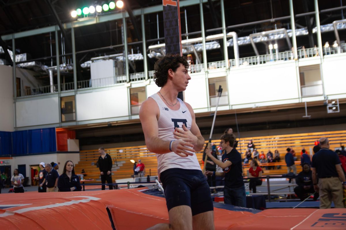 Freshman Gator Young celebrates after a successful attempt in the men’s pole vault event at the Illini Last Chance indoor track and field meet held at the Armory on Friday. This meet closes out the indoor regular season as the Illinois teams prepare for the Big Ten Indoor Championships on Feb 26.