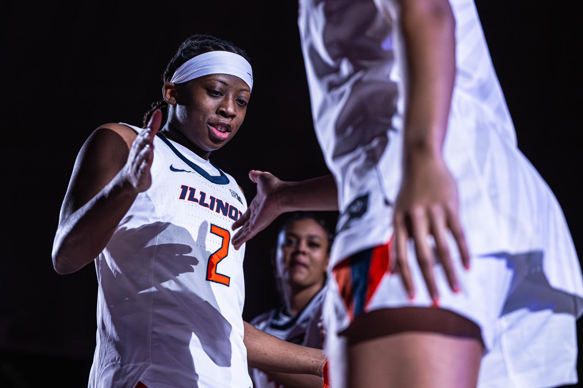 Freshman guard Destiny Jackson does her pregame handshake leading up to the Illinois v. Maryland game on Jan. 1. Illinois would go on to win by a final score of 73-70.